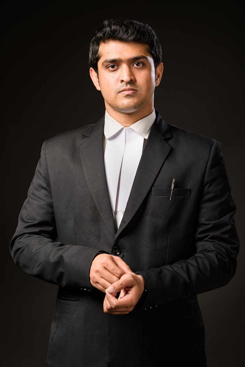 One of the ARS LAW founding advocates in a formal studio portrait.